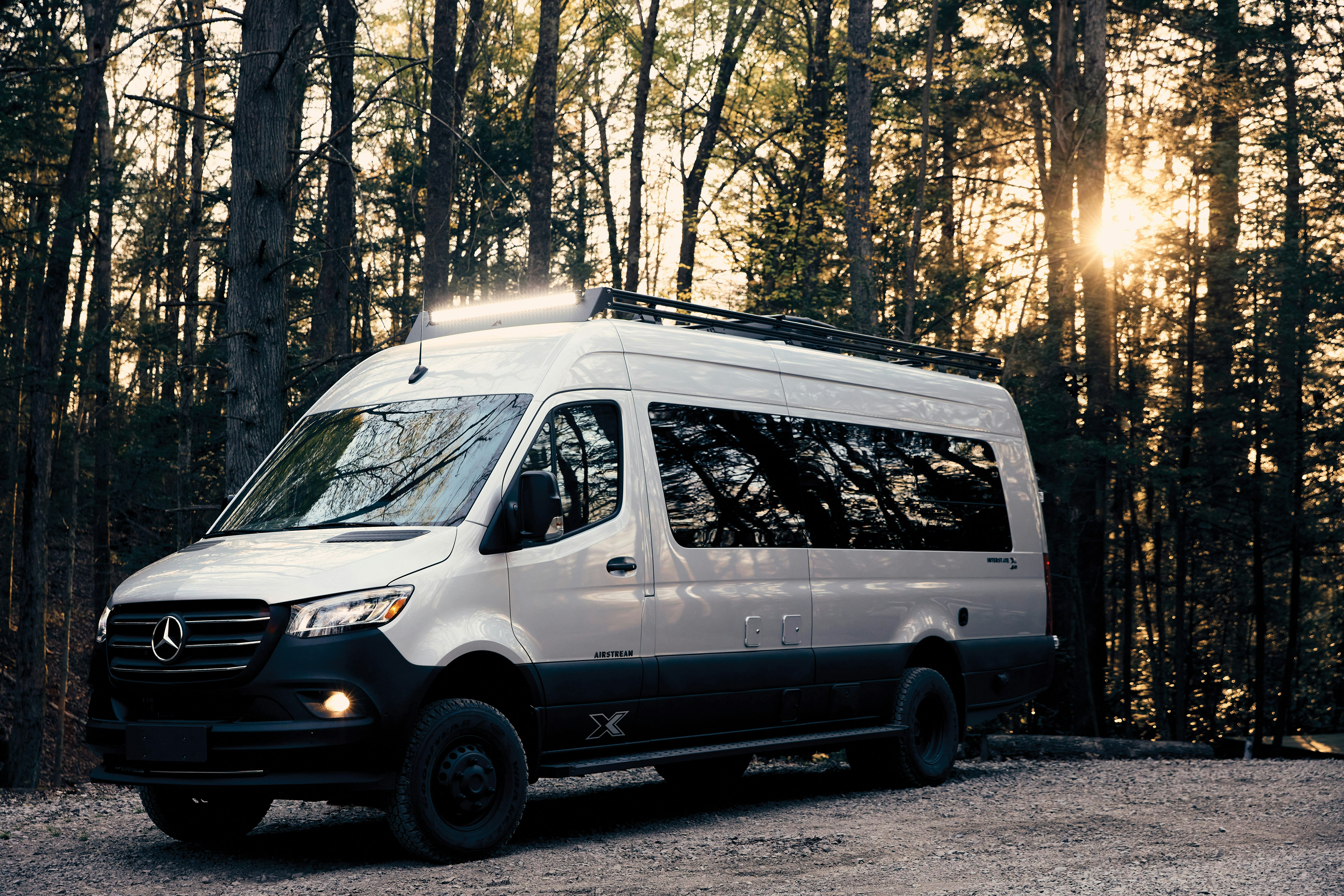 white van parked on the side of the road